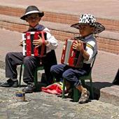 Answer musicians,accordion,sidewalk